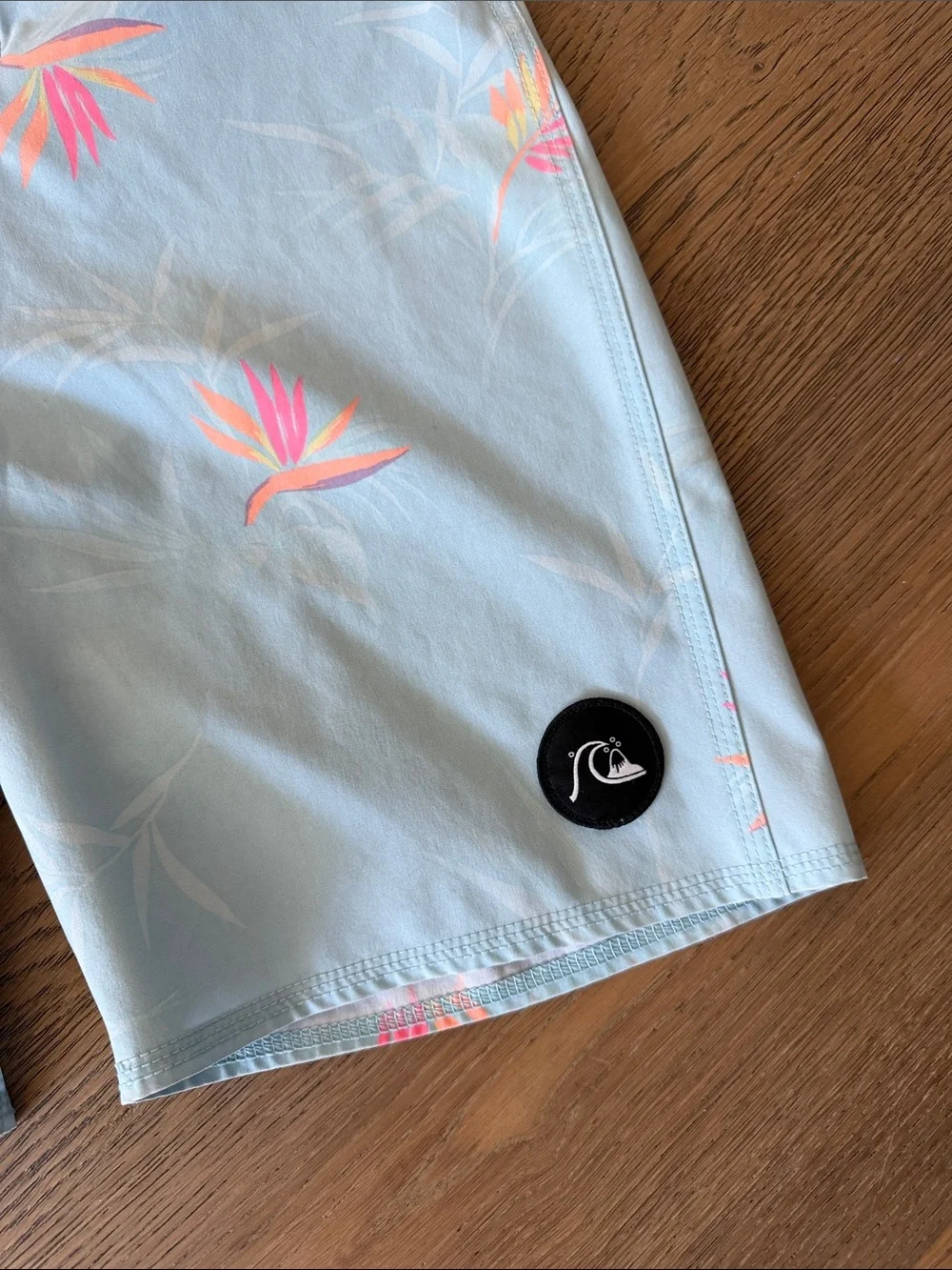 Quiksilver Men’s Pale Blue Boardshorts with Pink Floral Accents